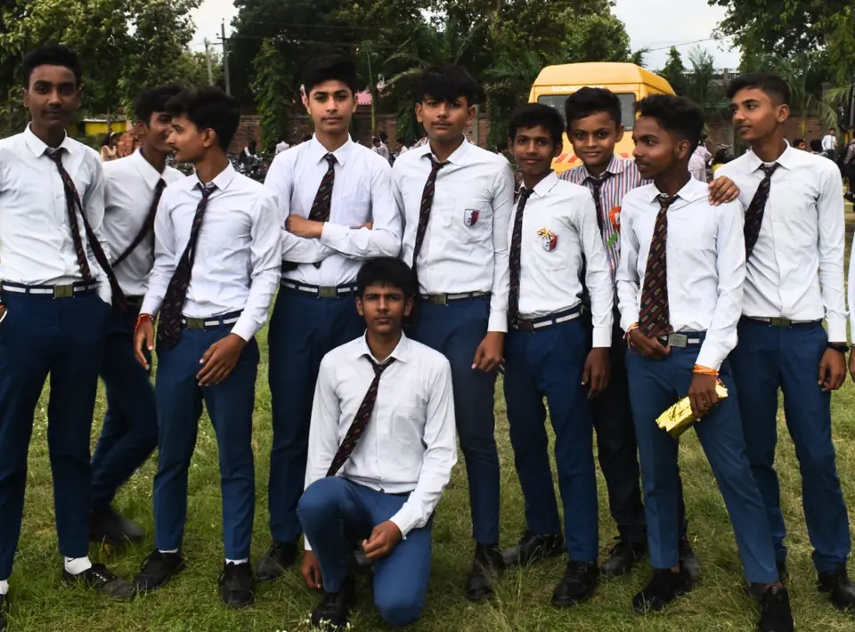 Senior students in uniform on the school ground