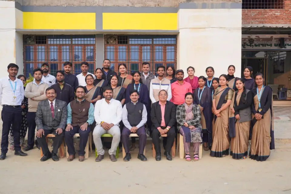 Teachers and staff of Udai Public School in front of the school building